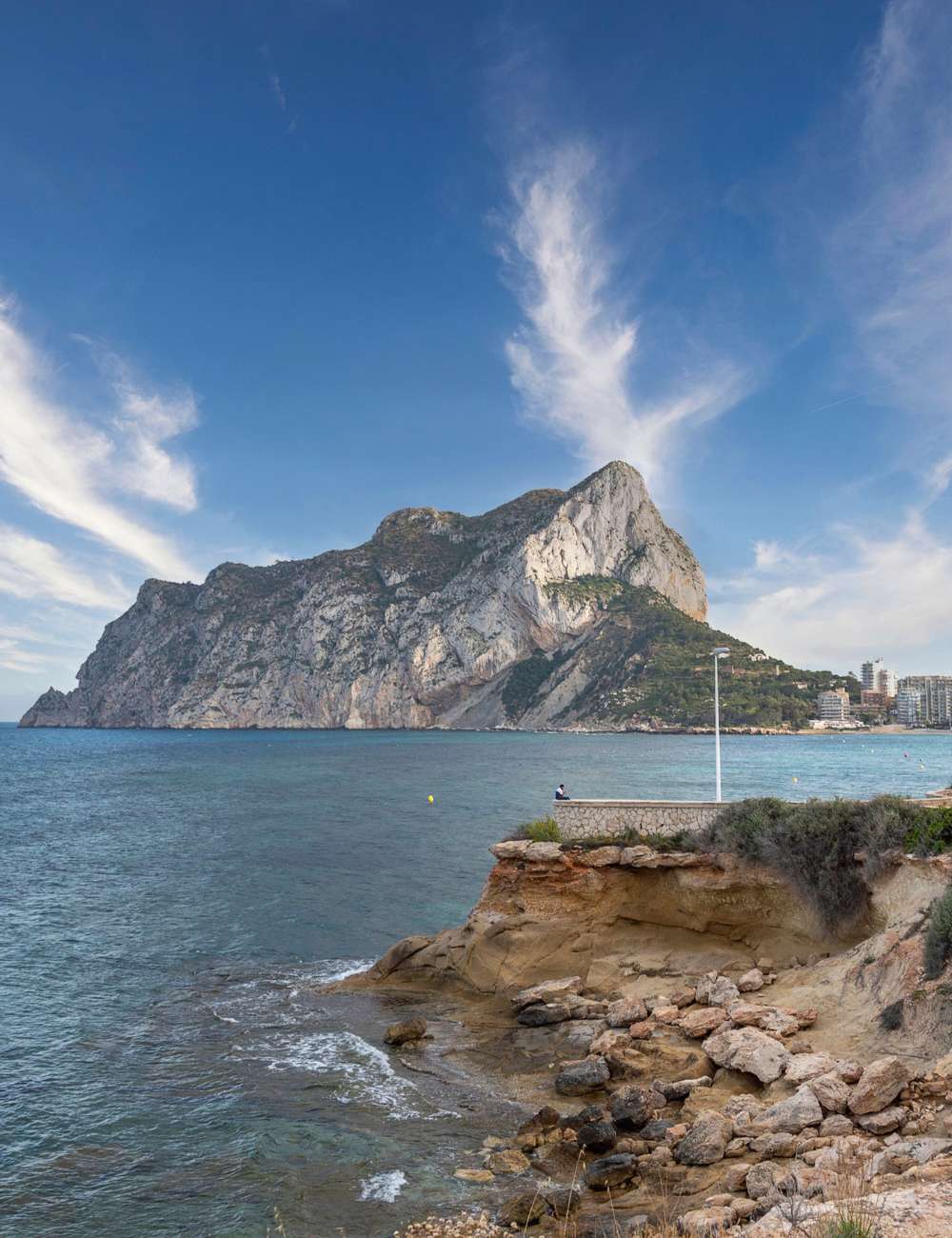 View of the Rock of Ifach rising above the Mediterranean in the Marina Alta region near Dénia