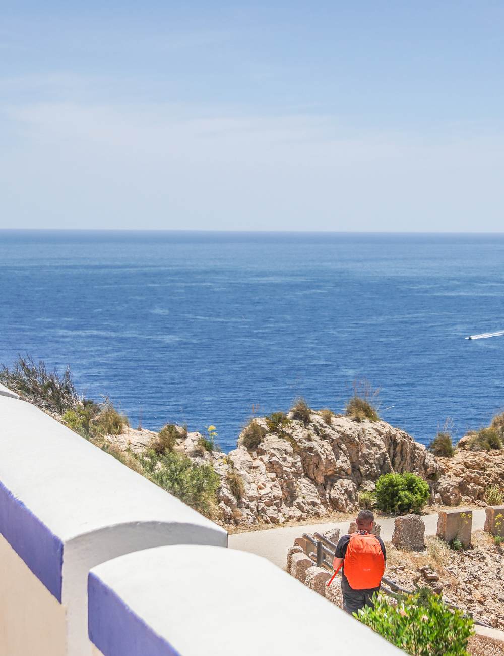 Mediterranean Sea meets rocky viewpoint on Albir coast
